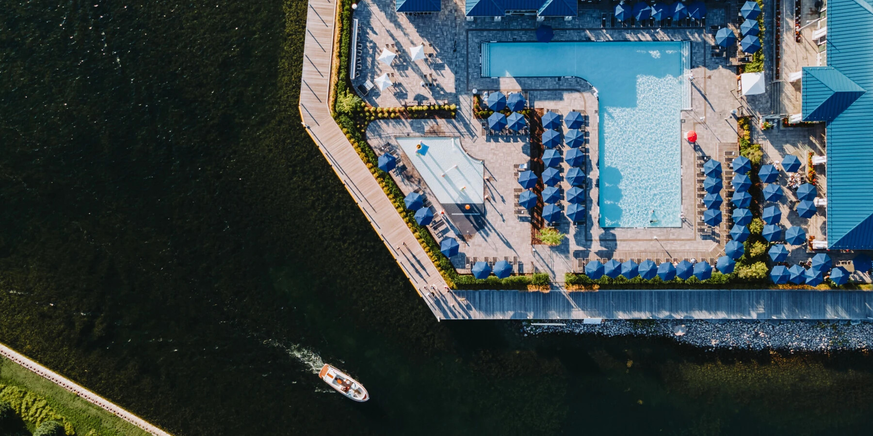 Friday Harbour resort arial view featuring a pool and beach club