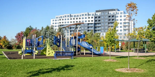 Kids playground with manett building behind