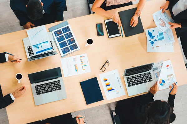 Employees working at a desk