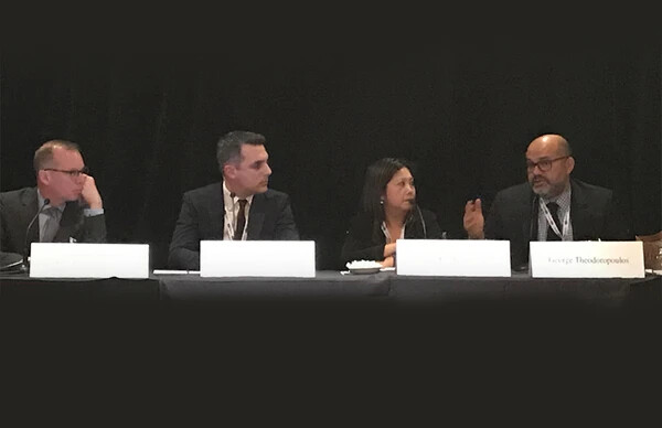 George Theodoropoulos onstage at CAIP East