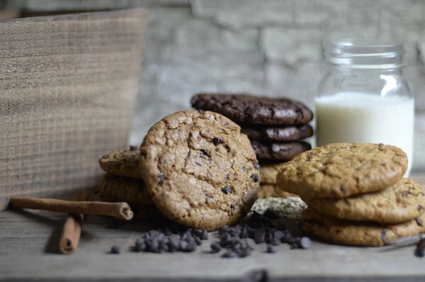 Assorted Cookies with jar of milk