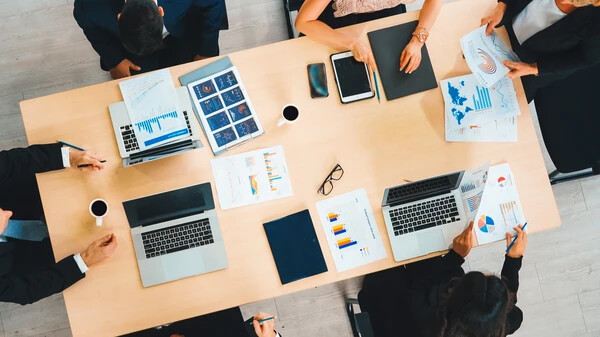 Employees working at a desk